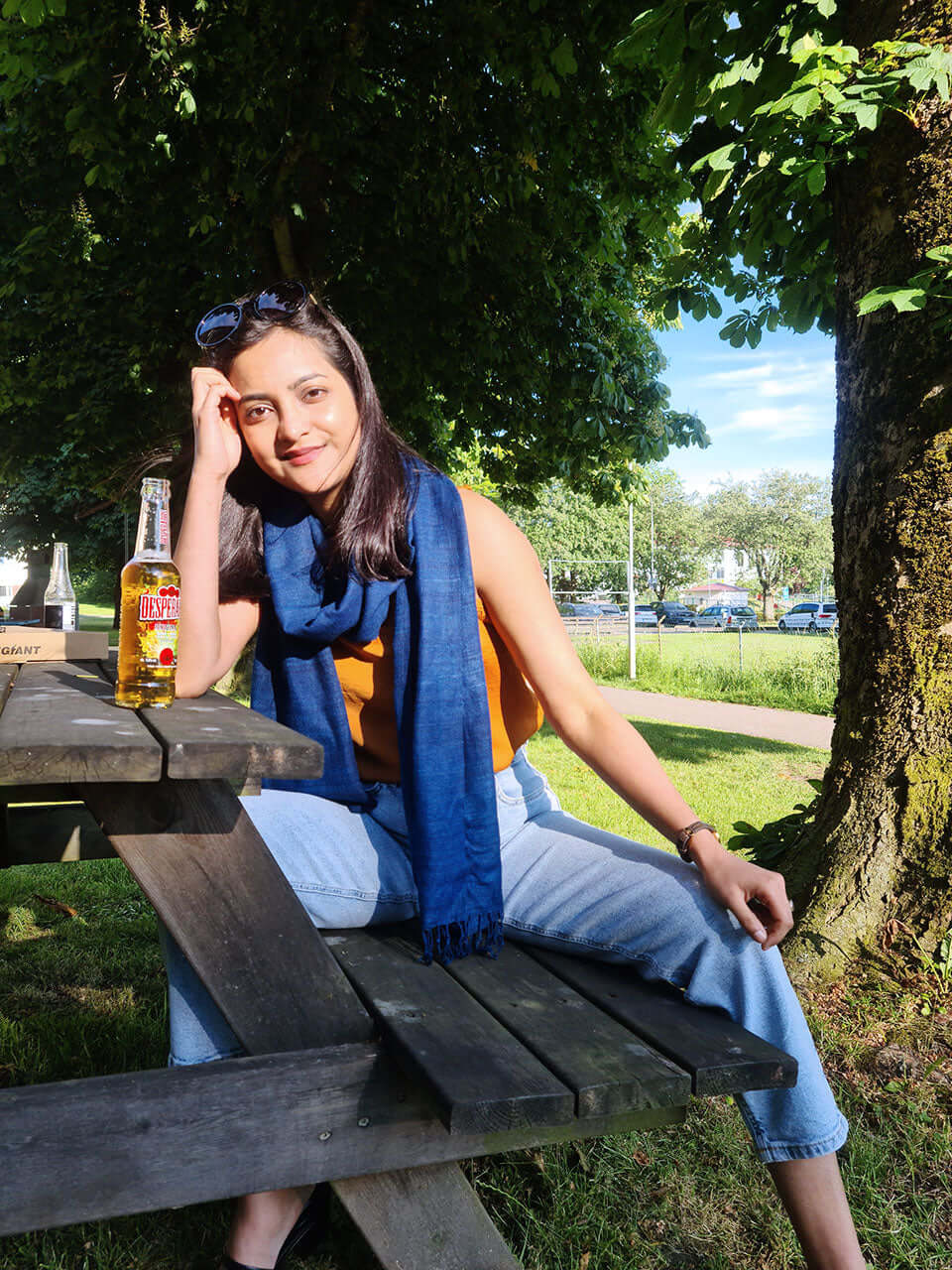girl wearing a blue stole