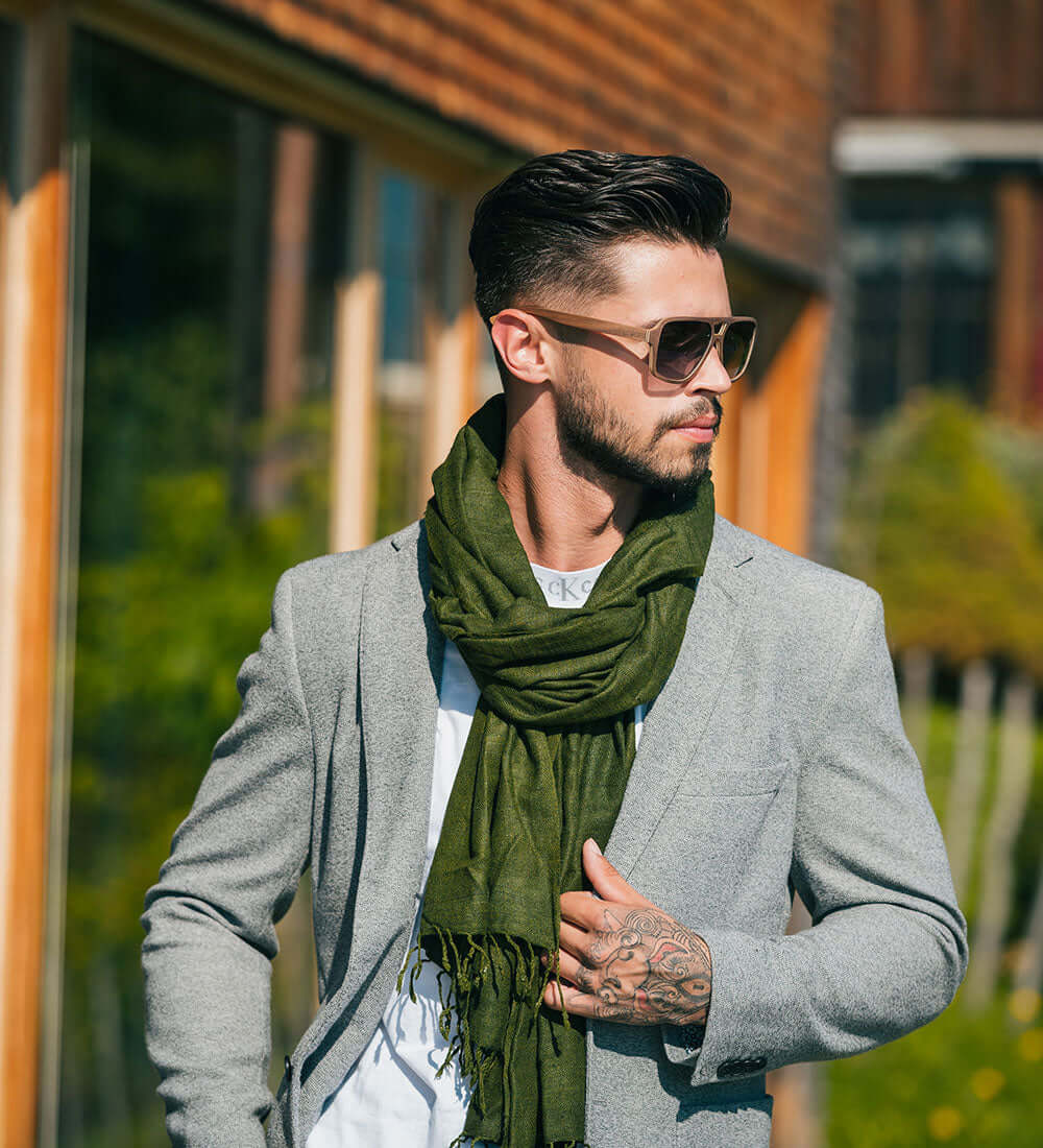 a guy wearing a stole and sunglasses