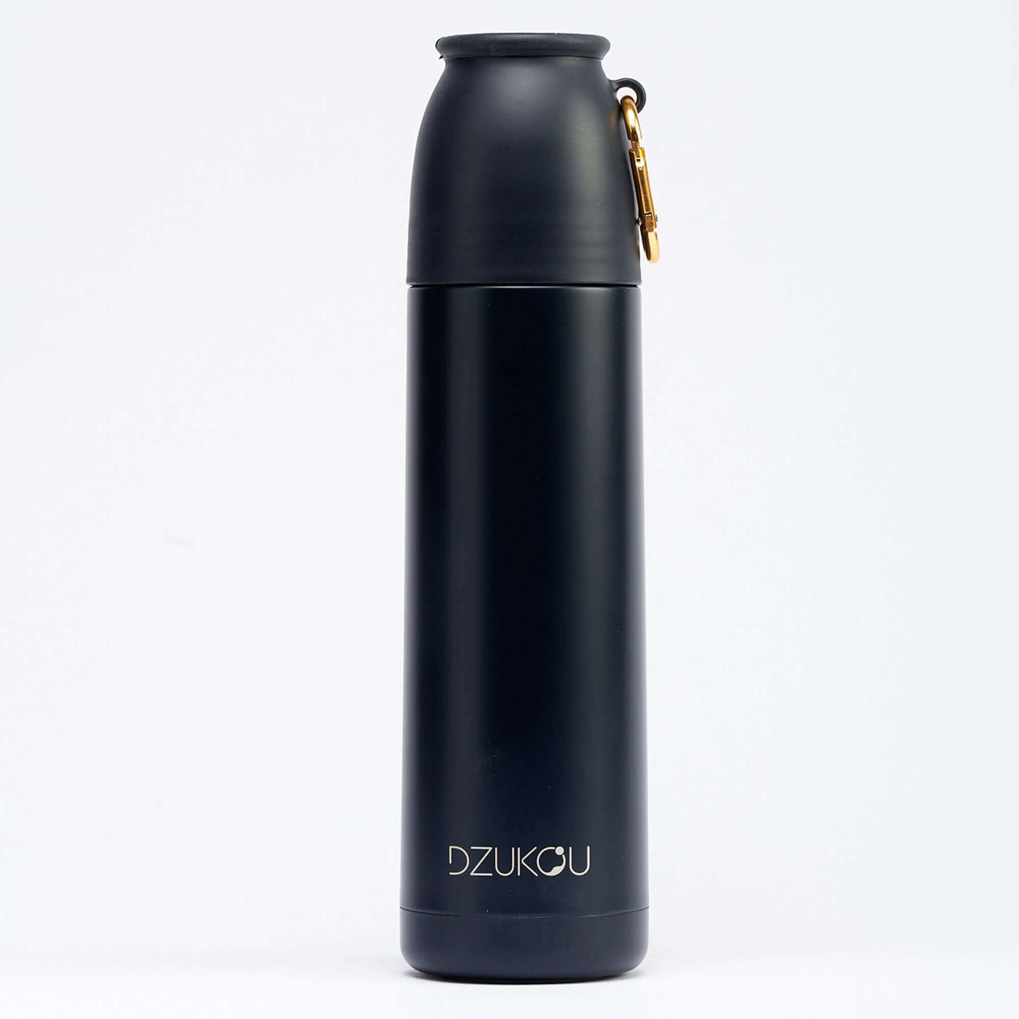 A black water bottle in a clean white background, showcasing a blend of modern and natural design elements.