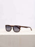 A wooden sunglasses featuring a stylish wooden frame in a clean surface with a neutral background, showcasing a unique and eco-friendly design.