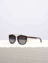 A wooden sunglasses featuring a stylish wooden frame in a clean surface with a neutral background, showcasing a unique and eco-friendly design.