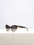 A wooden cat eye sunglass featuring a stylish wooden frame in a clean surface with a neutral background, showcasing a unique and eco-friendly design.