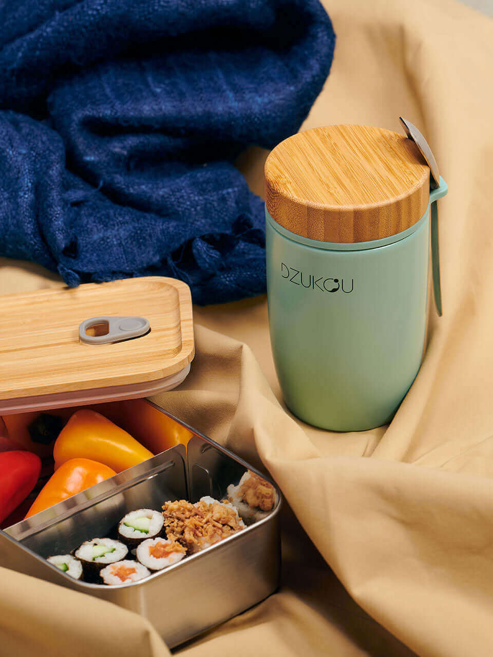 A bamboo lunch box with a bamboo lunchpot, elegantly designed for convenient and eco-friendly dining on the go.