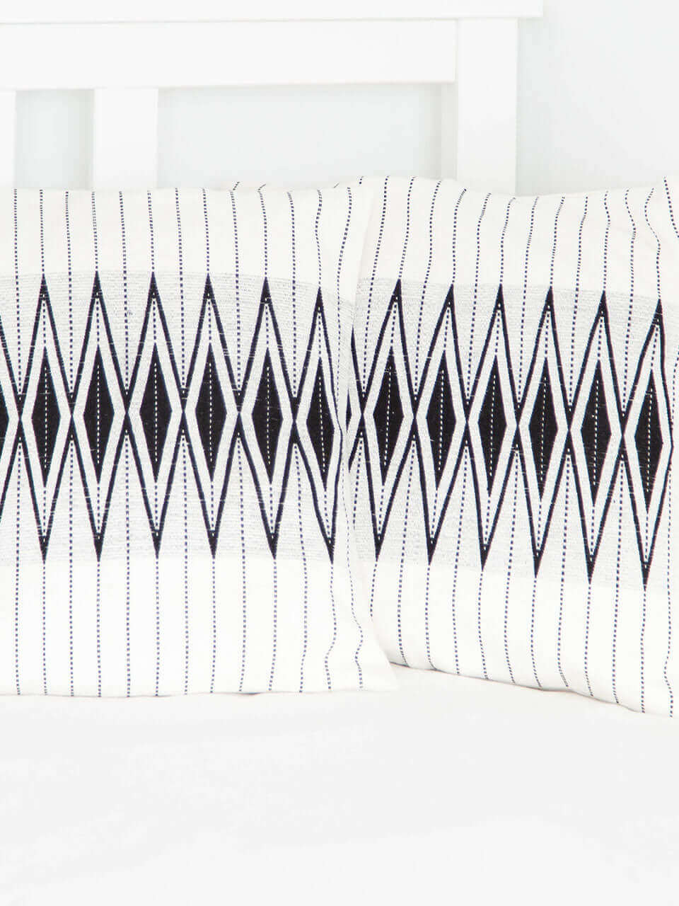 Two pillow cover featuring a stylish black and white striped pattern, adding a modern touch to any decor.