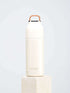 A white water bottle featuring a handle, showcasing a blend of modern and natural design elements.