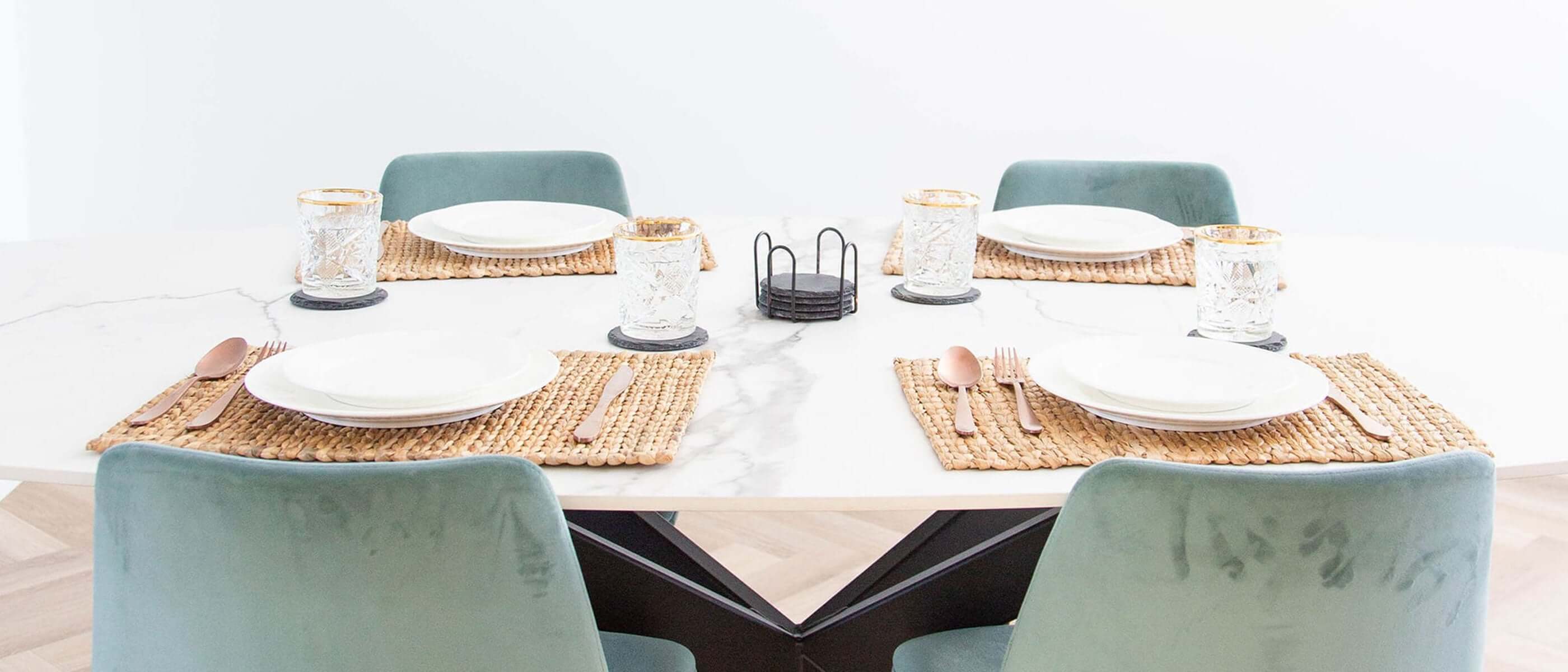 a table set nicely with dinnerware