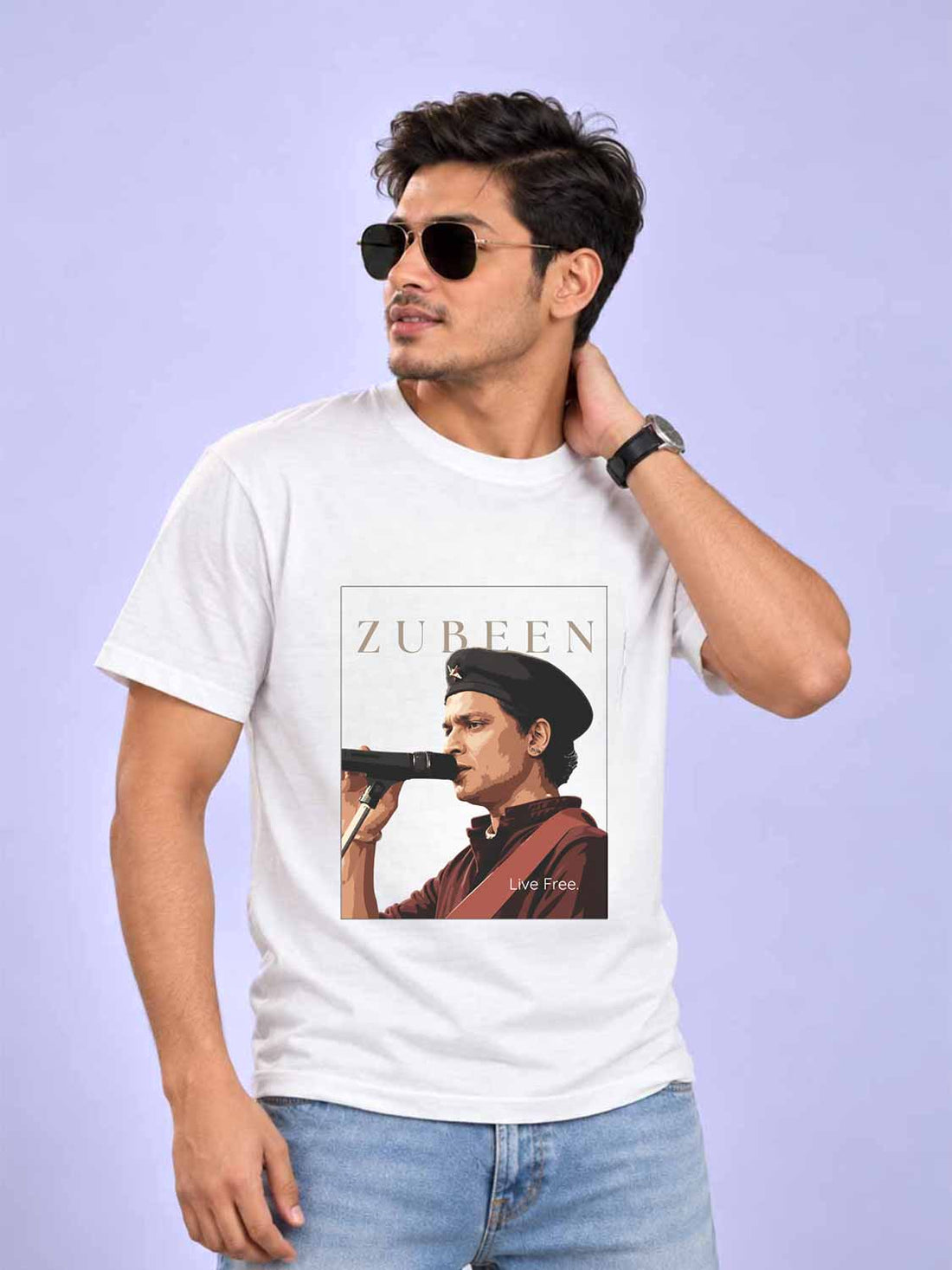 A man wearing a white graphic t-shirt with a &