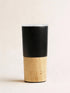 Black and wooden grinder with &
