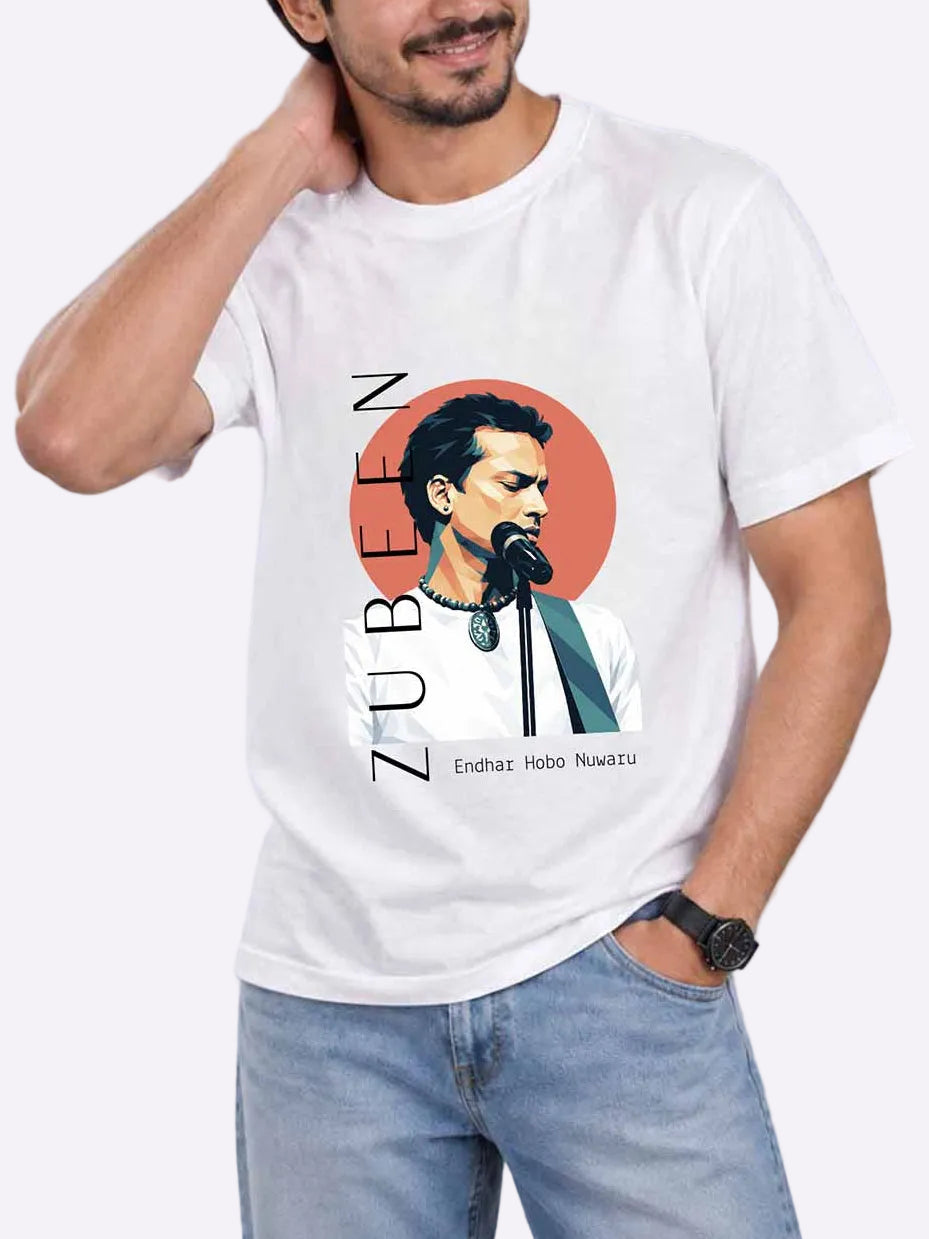 A man wearing a white graphic t-shirt featuring a stylized portrait of Hibo Nawaz and the text &