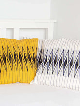 white and yellow cushions covers