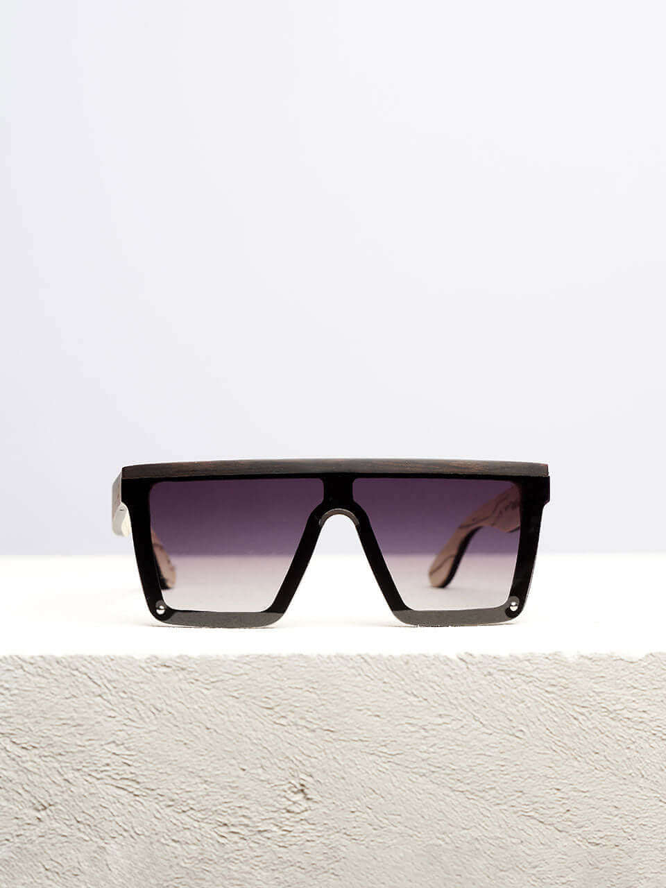 a pair of wooden sunglasses