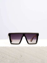 a pair of wooden sunglasses