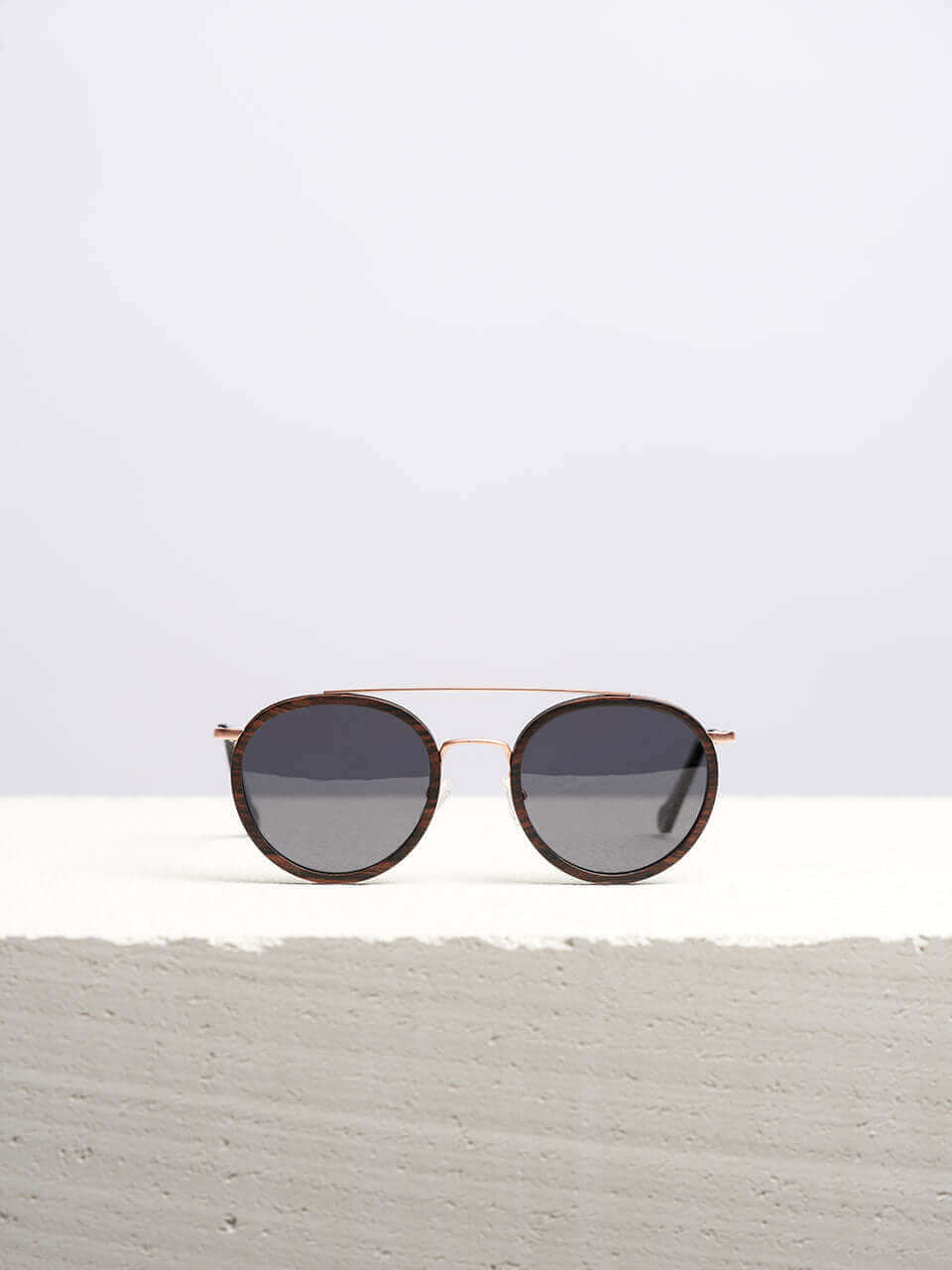 Stylish Wooden Sunglasses kept on a white table