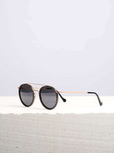 Wooden Sunglasses in a white background
