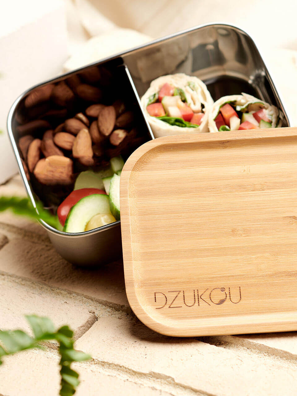 bamboo lunch box with veggies inside