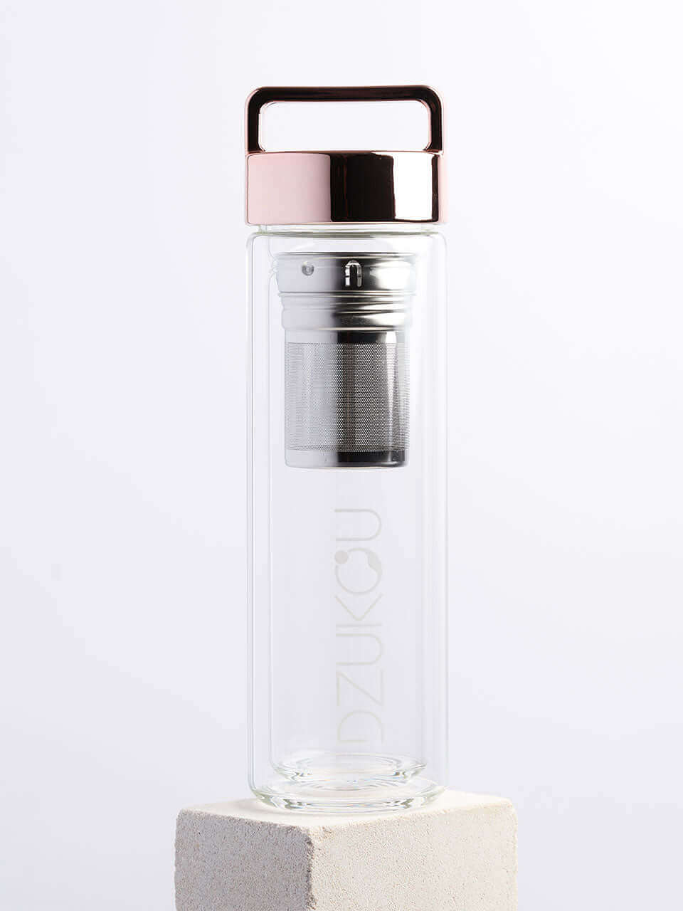 Rose gold glass bottle with infuser