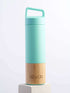 A green and bamboo water bottle featuring a handle, showcasing a blend of modern and natural design elements.