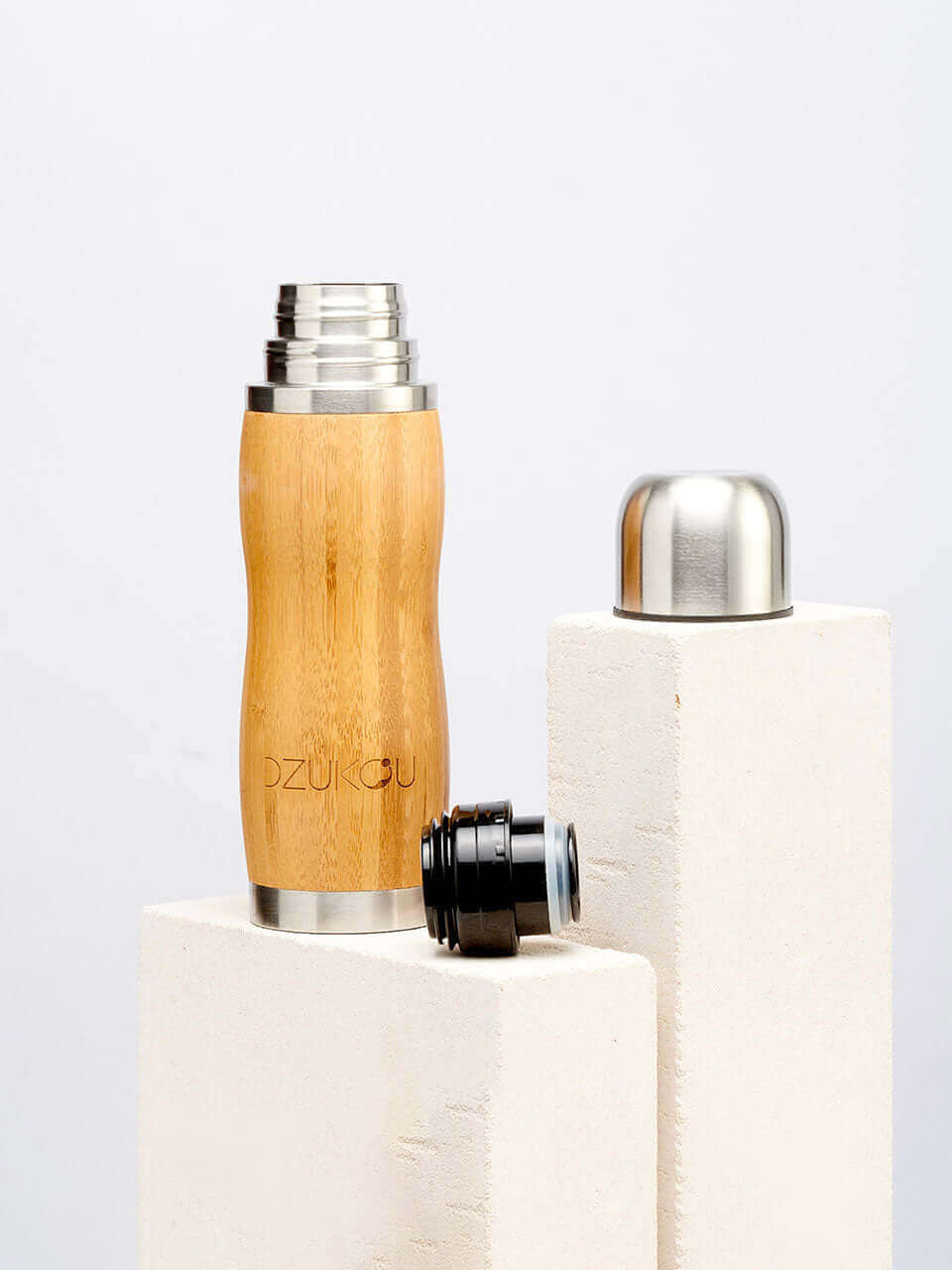 Bamboo and Stainless Steel Thermos Bottle kept on a white background