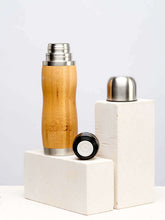 Bamboo Thermos Bottle kept on a white background