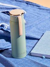 Blue Bottle with a bamboo lid
